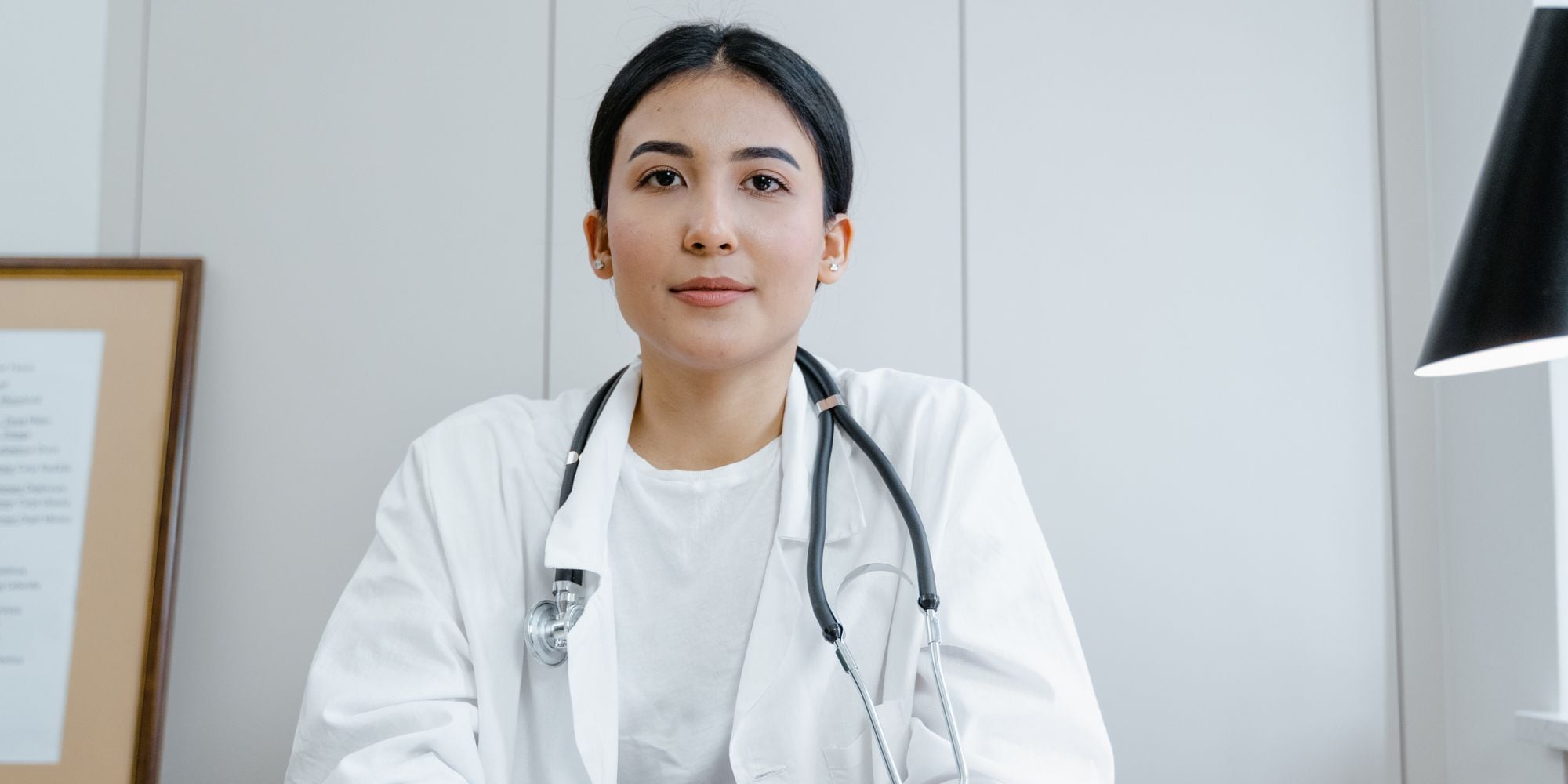 A woman about to explain what you can expect from an in-clinic abortion.